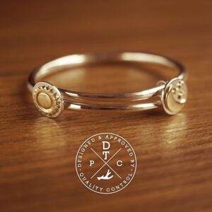 Tailor-made Sterling Silver baby bangle with sun and moon design