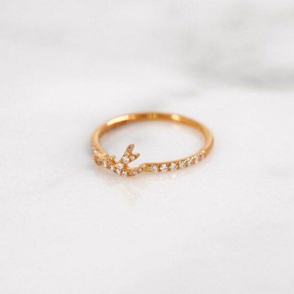 Delicate diamond antler ring in rose gold.
